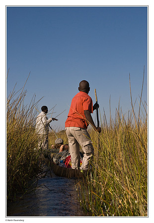 Traveling by mokoro's in the Okavango Delta - Botswana