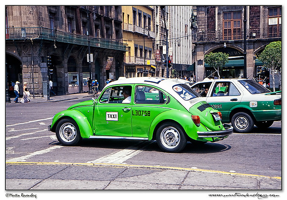 One of thousands of Mexico City green taxis (Beetles)