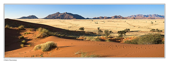 Sunset over Elim Dune and the Naukluft Mountains near Sesriem